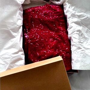 Backless, cashmere, red with sequins evening dress by Donna Karan.